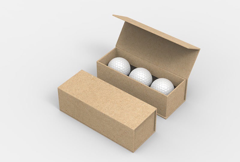 golf balls are placed in boxes after completion